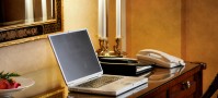 Laptop on desk in hotel travel