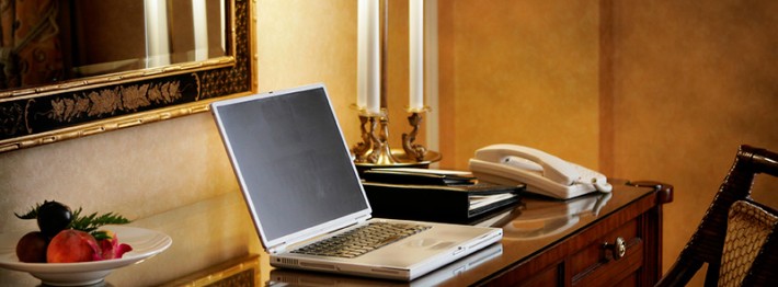 Laptop on desk in hotel travel